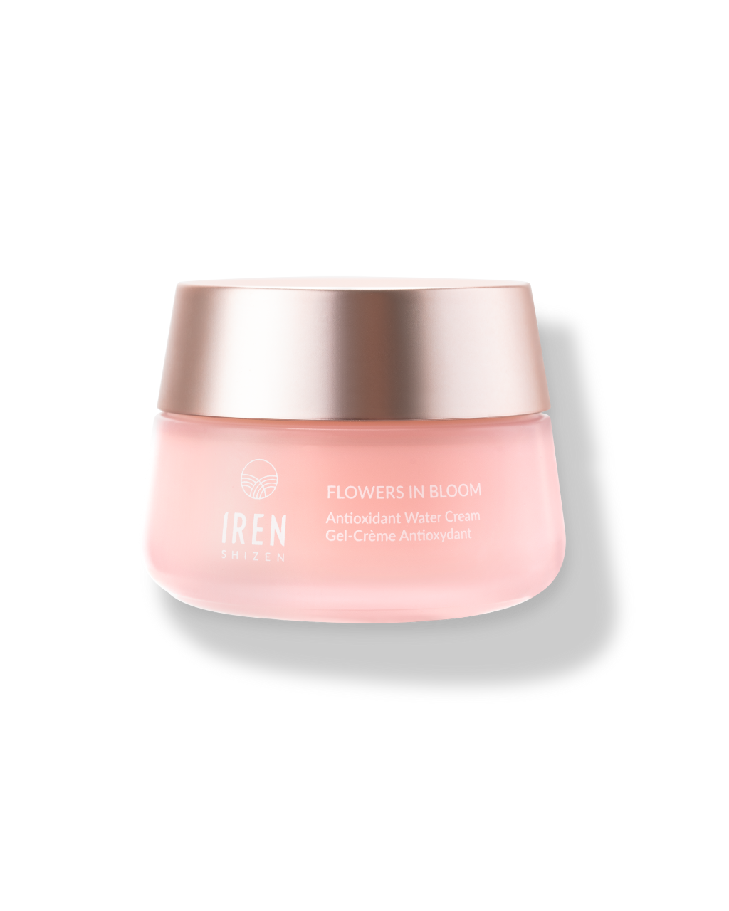 Rose-tinted cosmetic jar with metallic lid labeled "IREN Shizen FLOWERS IN BLOOM Antioxidant Water Cream" on a white background.