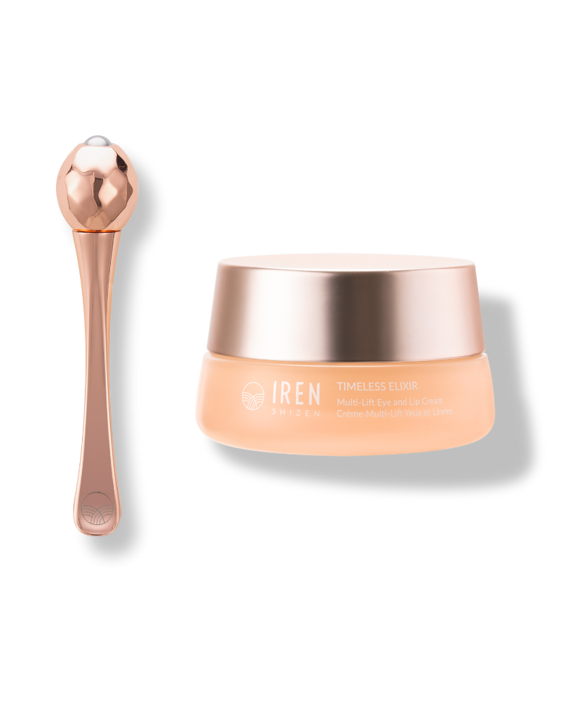 A jar of TIMELESS ELIXIR Multi-Lift Eye and Lip Cream by IREN Shizen with Bakuchiol, accompanied by a rose gold applicator with a spherical end, perfect for eye area rejuvenation and anti-aging.