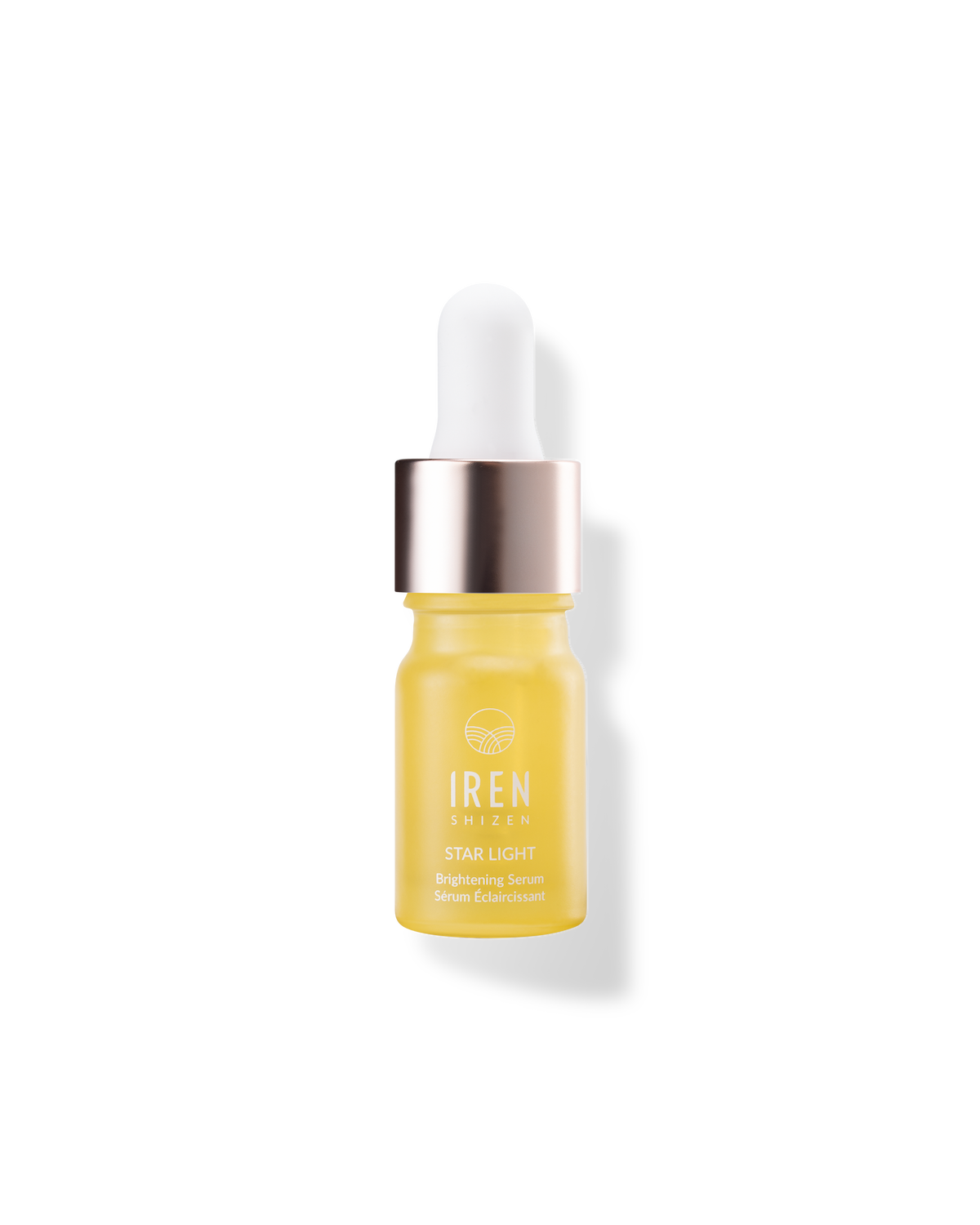 A bottle of STAR LIGHT Brightening Serum by IREN Shizen on a black background.