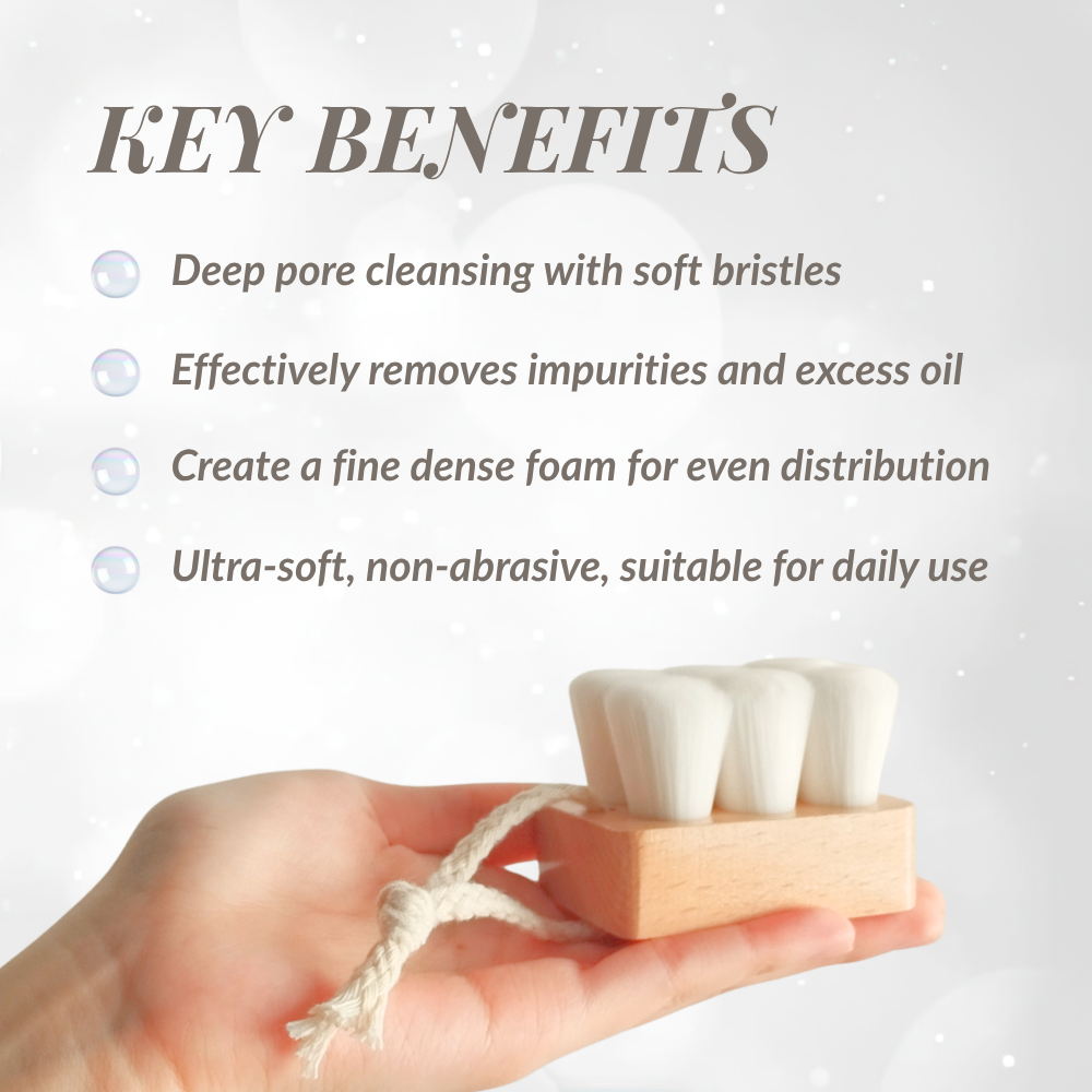 A hand holds the Fast Bundle Cloud Cleansing Kit’s wooden brush with white bristles and rope loop, as text highlights the benefits of using it alongside an enzyme powder wash on a light background.