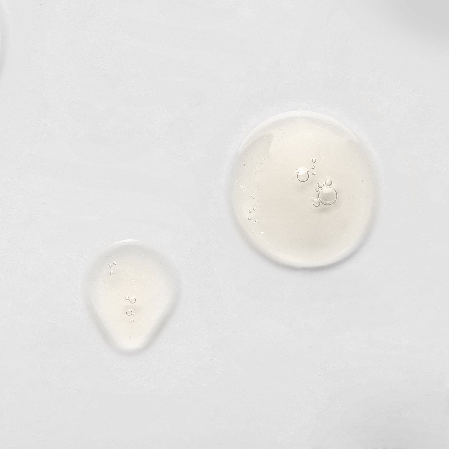 A group of custom skincare IREN Shizen KEEP CALM Soothing Serum circles on a white surface. #all-groups